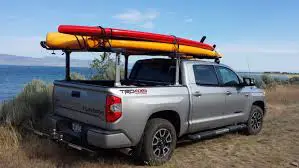 Truck with paddle boards in the back