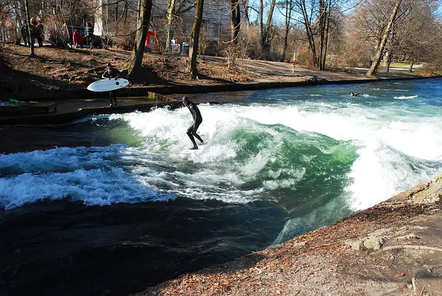 Paddle board surfing on the river